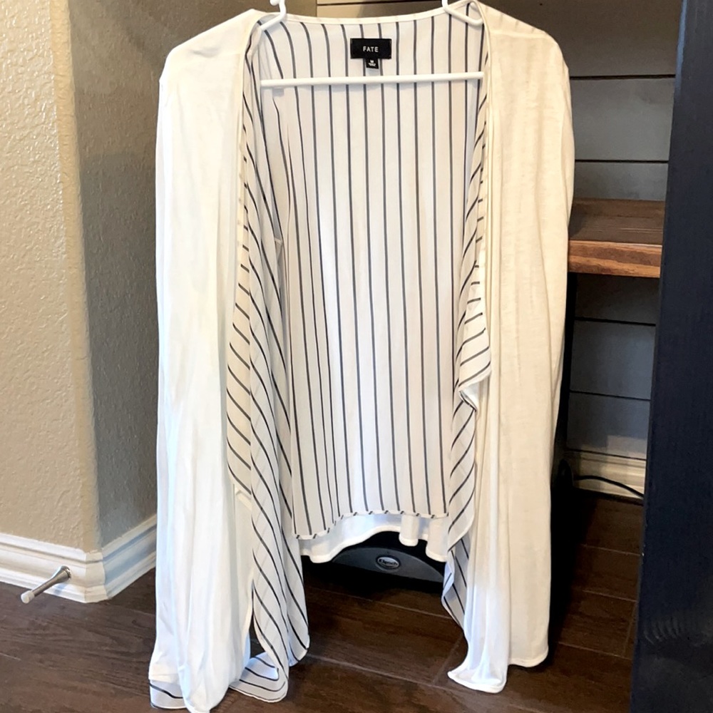 White Cardigan, lined on the inside with black and white stripes